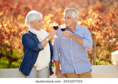 Senior couple, wine tasting and drink together for memories, relationship and retirement on vineyard. Toasting, man and woman excited on farm visit with alcohol for celebration, date or love - Powered by Shutterstock