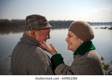 Senior Couple Woman Touching Man's Face