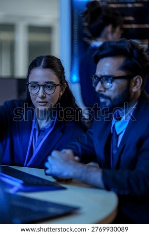Senior cybersecurity analyst executing digital forensic investigation on network breach. Blue team specialist monitoring advanced persistent threat indicators in security operations center.