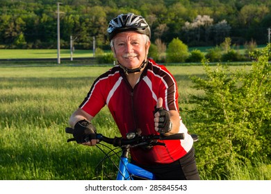 Senior cyclist in the nature liking his sport