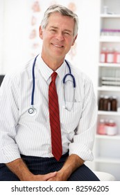 Senior Doctor In Consulting Room