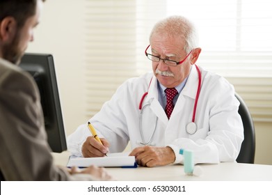 Senior Doctor With His Patient