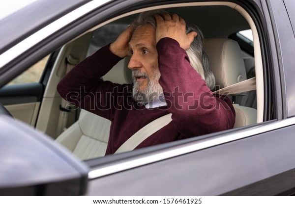 Senior driver is\
stressed because\
accident