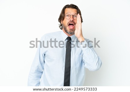Senior dutch business man isolated on white background shouting with mouth wide open