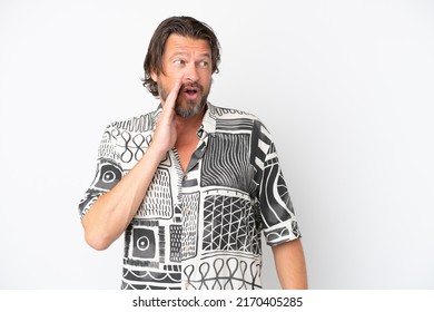 Senior dutch man isolated on white background whispering something with surprise gesture while looking to the side