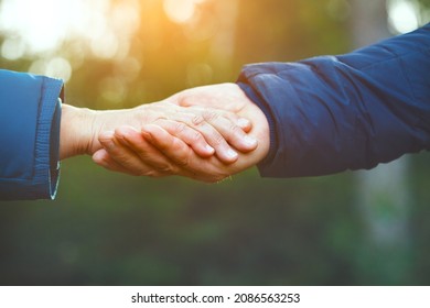 Senior Elderly Couple Holding Hands Walking Together 