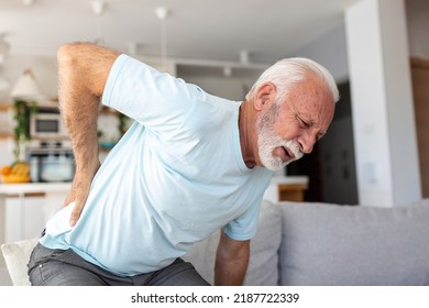 Senior Elderly Man Touching His Back, Suffering From Backpain, Sciatica, Sedentary Lifestyle Concept. Spine Health Problems. Healthcare, Insurance