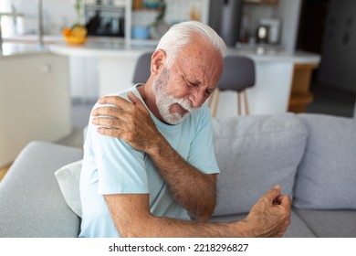 Senior Elderly Man Touching His Shoulder, Suffering From Shoulder Pain, Sciatica, Sedentary Lifestyle Concept. Shoulder Health Problems. Healthcare, Insurance