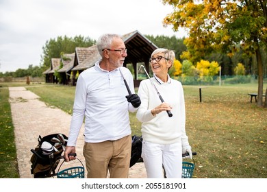 Senior elegant people enjoy spending their free time in retirement by playing golf game.