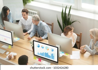 Senior Executives Teaching Young Employees Office Stock Photo ...