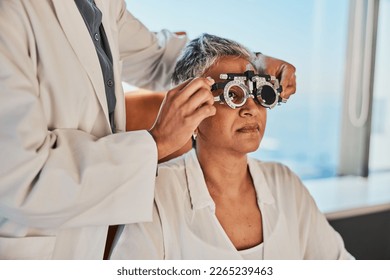 Senior eye exam, optometrist and medical eyes test of elderly woman at doctor consultation. Vision, healthcare focus and old female patient with consulting wellness expert for lens and glasses check - Powered by Shutterstock