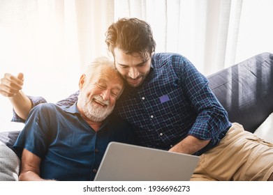 Senior Father Hugging Adult Son, Aged Father And Hipster Son Living Together At Home, Hug And Happy Relation Lifestyle, Fatherhood Activity Indoor At The House, 2 Man Person Family Elderly Generation