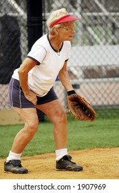 Senior Female Catcher On Softball Team.  With Mitt.