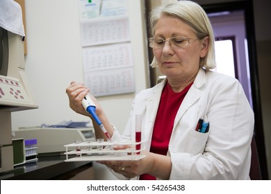 Senior Female Scientist Working In The Laboratory