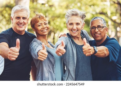 Senior fitness group, thumbs up and portrait with smile, diversity and happiness in park for wellness. Happy workout friends, retirement and hand gesture for motivation, teamwork and focus for health - Powered by Shutterstock