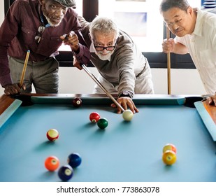 Senior Friends Playing Pool