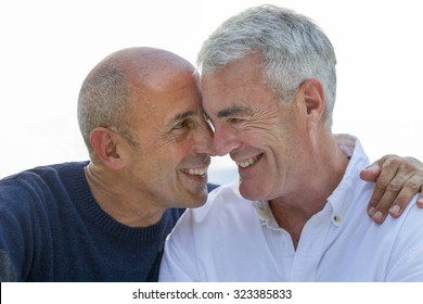 Senior Gay Male Couple Being Affectionate