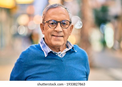 Senior grey-haired man smiling happy standing at the city. - Powered by Shutterstock