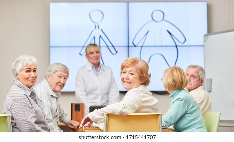 Senior Group And A Doctor In A Nutritional Counseling Session At The Adult Education Center