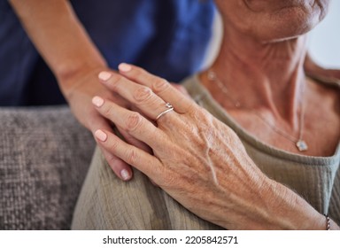Senior, hands and care for love, support in mature health and generations indoors at home. Hand of a elderly lady holding caregiver in trust, comfort and reliable gentle embrace and respect for elder - Shutterstock ID 2205842571