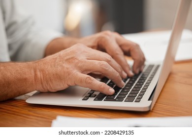 Senior Hands, Laptop And Typing Email, Online Web Search Or Writing Article Using Computer Keyboard At Home. Closeup Man, Freelancer Or Remote Worker Using Information Technology With Wifi Connection