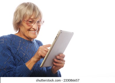 Senior Happy Woman Using Ipad Isolated On White Background 