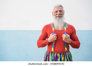 Senior Hipster Gay Man Smiling On Camera Outdoors - Focus On Face