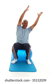 Senior Hispanic Man Working On A White Background