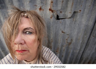 Senior Homeless Woman With Too Much Makeup