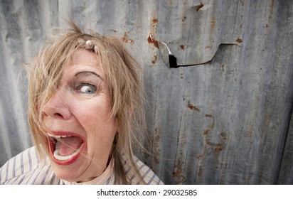 Senior Homeless Woman With Too Much Makeup Screaming