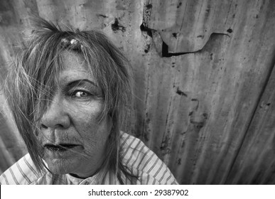 Senior Homeless Woman With Too Much Makeup