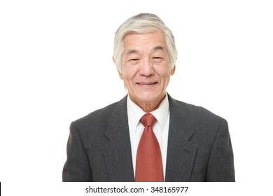 senior Japanese businessman smiles