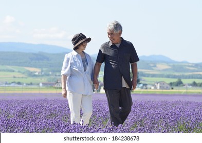 Senior Japanese Couple In The Lavender Field