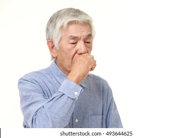 Senior Japanese Man Coughing