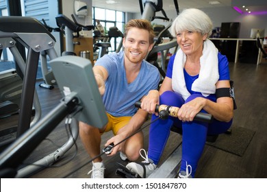 Senior Lady Doing Rowing Machine