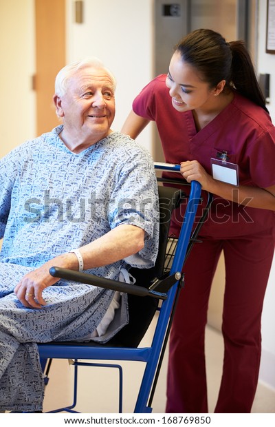 Senior Male Patient Being Pushed Wheelchair Stock Photo 168769850 ...