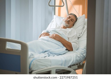 Senior male patient in a modern hospital (shallow DOF; color toned image) - Powered by Shutterstock