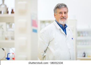 Senior male researcher carrying out scientific research in a lab (shallow DOF; color toned image) - Powered by Shutterstock