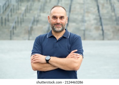 Senior Man 50 Years Old Looking At The Camera. Portrait Of A Middle Aged Man.