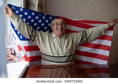 Senior man with american flag - Powered by Shutterstock