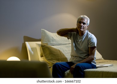 Senior Man Awake In The Bed