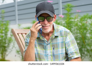 old man in a baseball cap