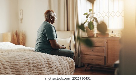 Senior man, bedroom and thinking in retirement home or nursing village for memory for idea. Male person, elderly care and planning for support, relax or reflection on life insurance as cancer patient - Powered by Shutterstock