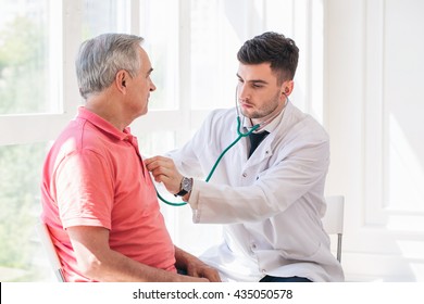 Senior man being examined by a doctor.