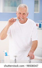 Senior Man Brushing Teeth