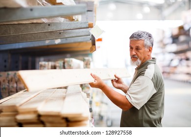 Senior Man Buying Construction Wood In A  DIY Store