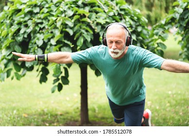 Senior Man Doing Single Leg Forward Bend Exercise