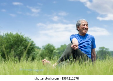 Senior Man Doing Yoga Outdoors