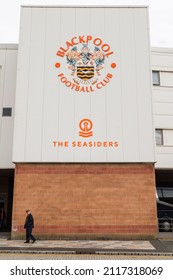 A Senior Man Dressed In An Orange Scarf Walks To Bloomfield Road To Watch Blackpool FC Take On Barnsley FC In September 2021.