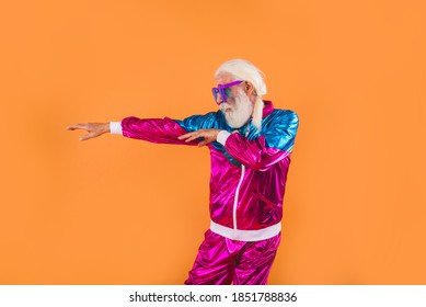 Senior Man With Eccentric Look  - 60 Years Old Man Having Fun, Portrait On Colored Background, Concepts About Youthful Senior People And Lifestyle